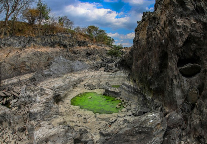 Drought land with small lake